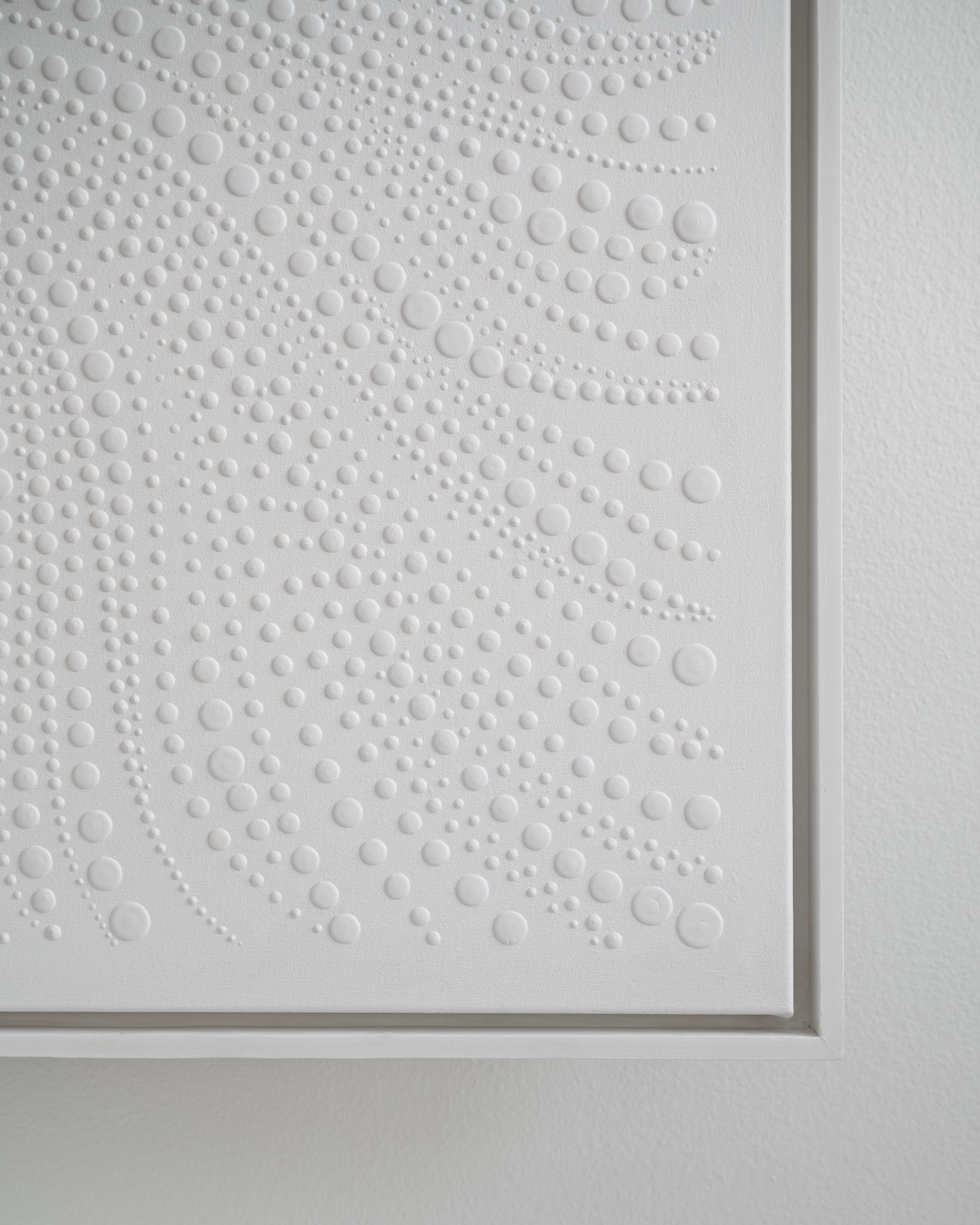 Rhythm of Peace: hand-formed raised white dots and canvas frame